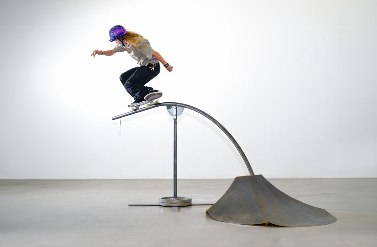 Zenga Bros. "Lamp Ramp", featuring skateboarder Andy Anderson. Photography by Gordon Nicholas. Image features a skateboarder riding a metal ramp that doubles as a lamp when tilted up.