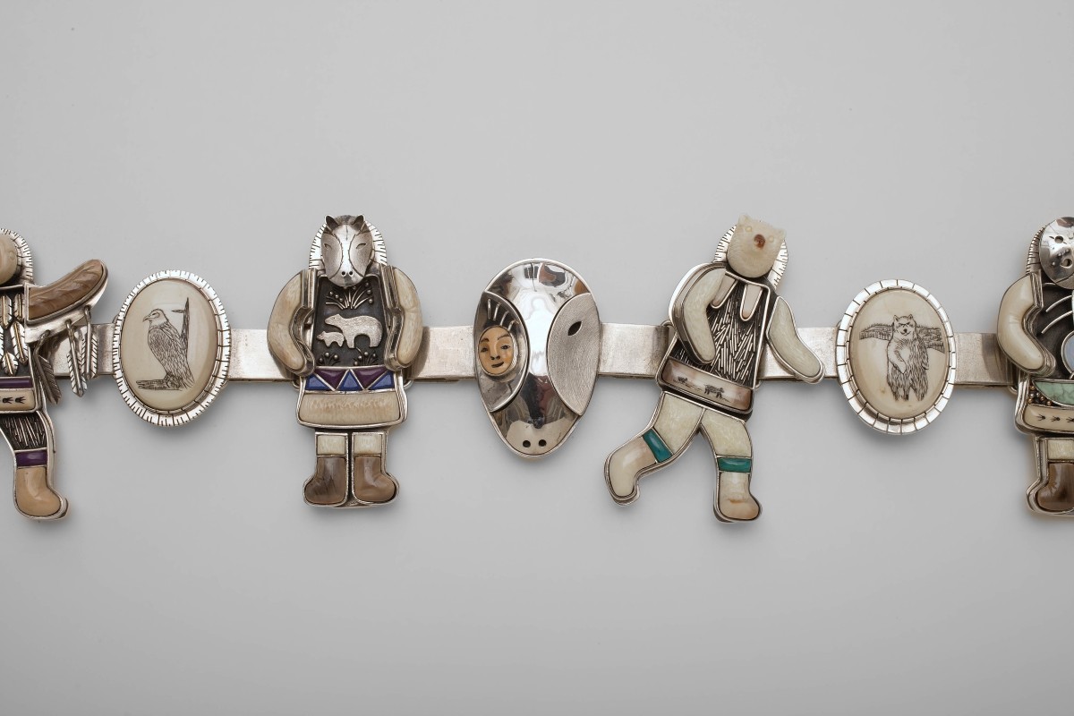 Belt - Five Arctic Shamans with Spirit Helpers in The Act of Transformation (detail), Denise Wallace, Chugach Eskimo-Aleut 1988, Alaska, U.S.A. Sterling silver, 14-karat gold, ivory (fossil and walrus), lapis lazuli. Collection Mingei International Museum. Gift of The Theodore Dubin Foundation, Connie Golden, Jean Hahn Hardy and Frances Hamilton White. Photo by Lynton Gardiner. 2000-65-001.