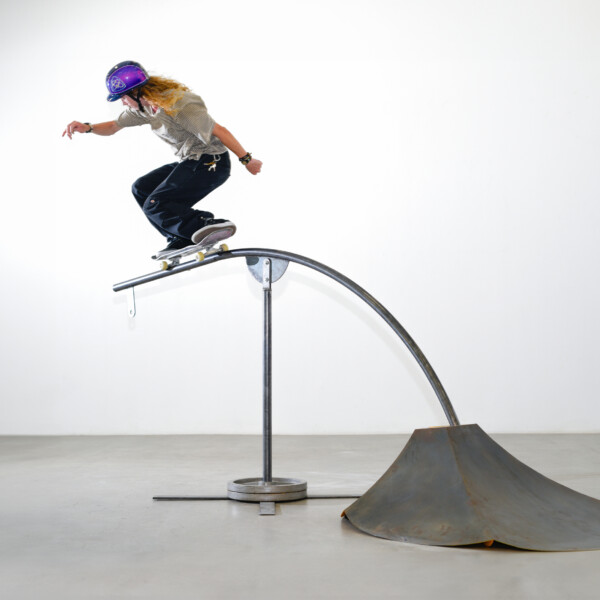 Zenga Bros. "Lamp Ramp", featuring skateboarder Andy Anderson. Photography by Gordon Nicholas. Image features a skateboarder riding a metal ramp that doubles as a lamp when tilted up.