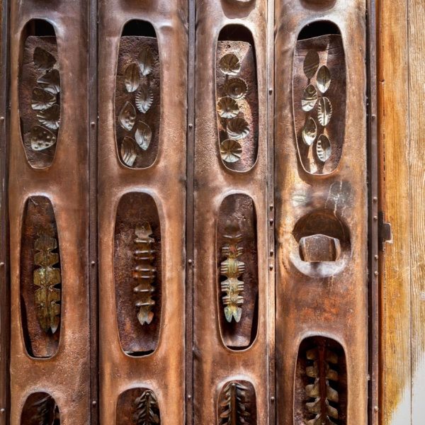 Detail of the laundry room door, designed and crafted by C. Carl Jennings, for his family home. Photo by Darren Bradley.